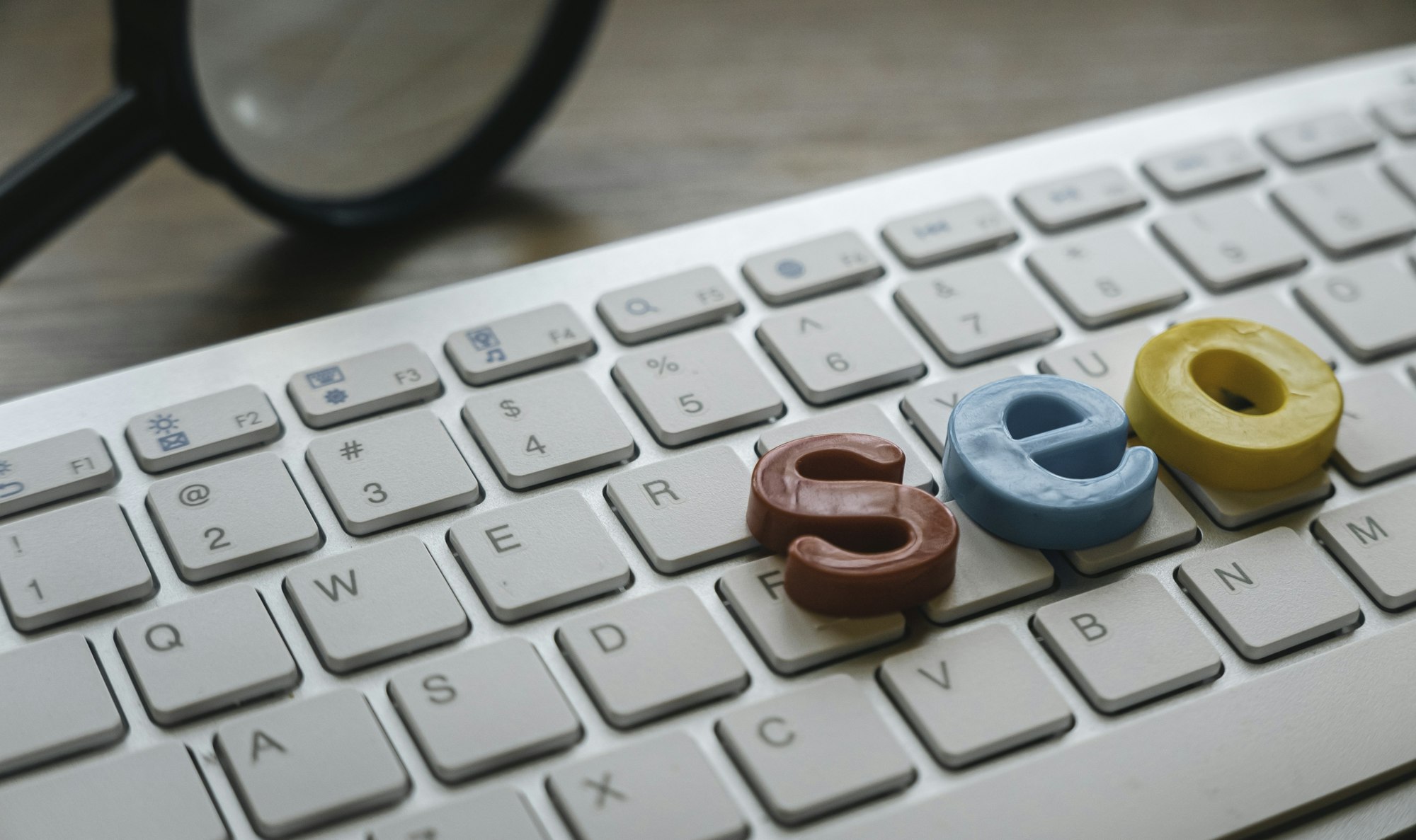 Search engine optimization concept. Alphabet of seo on a computer keyboard.